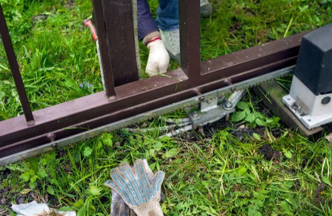 Automatic gate maintenance on a sliding gate motor and track system, part of reliable automatic gate servicing by Auto Gate Guys Sydney Automatic gate maintenance on a sliding gate motor and track system, part of reliable automatic gate servicing by Auto Gate Guys Sydney